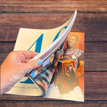 Load image into Gallery viewer, Festival International 40th Anniversary Book - Softcover