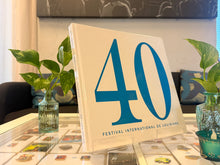 Load image into Gallery viewer, Festival International 40th Anniversary Book - Hardcover
